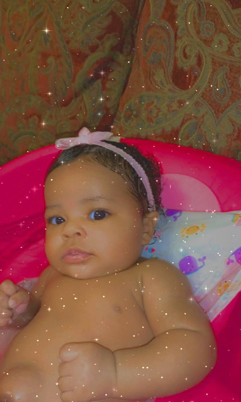 Nariyah joined the competition — help win amazing prizes! baby, baby_bathing, bathing, cheek, child, eye, face, fun, head, iris, person, pink, skin, smile, toddler