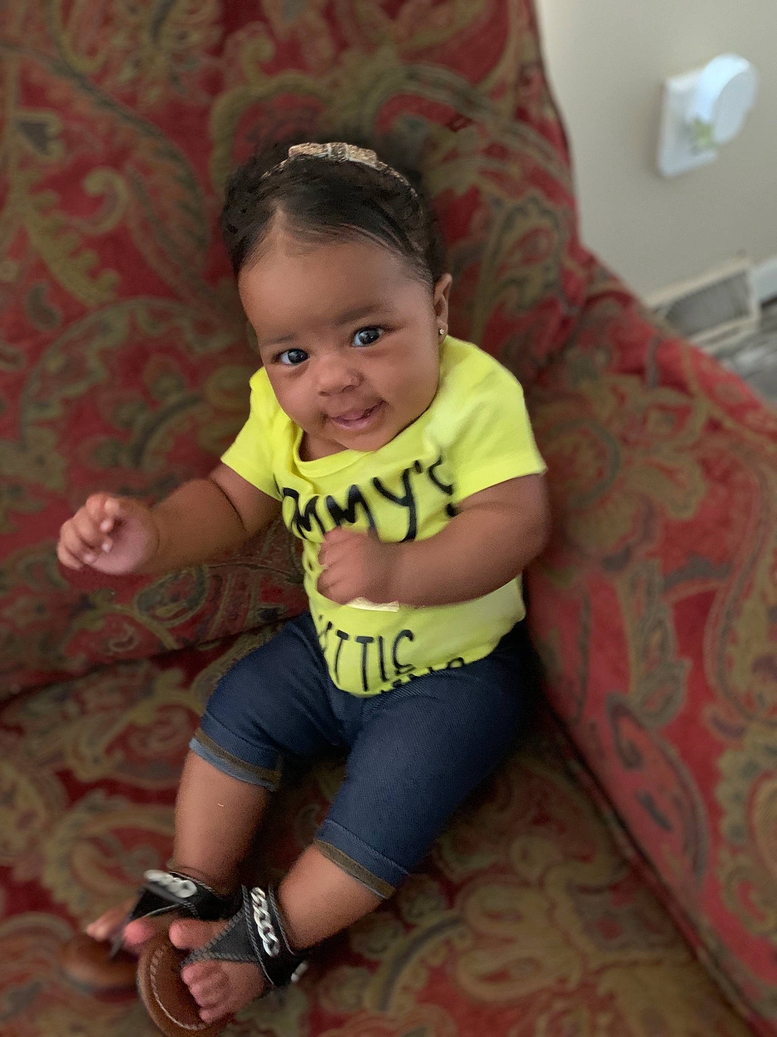 Nariyah is registered to the contest to win money with this photo: arm, baby, cheek, child, fun, leg, mouth, person, sitting, skin, smile, toddler