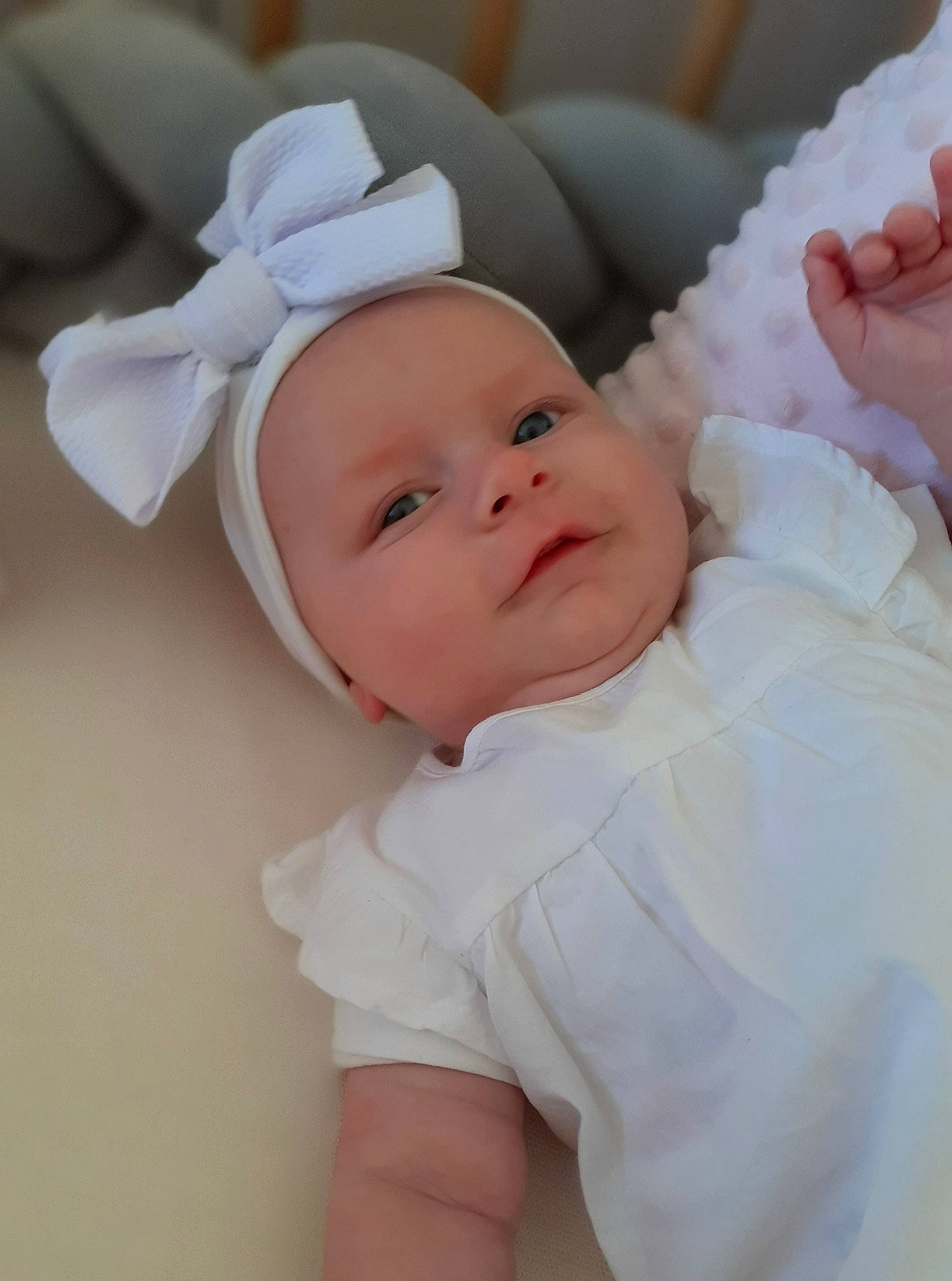 Lou participe au concours pour gagner de l'argent avec cette photo : baby, cheek, child, headgear, person, pink, product, skin, smile, toddler