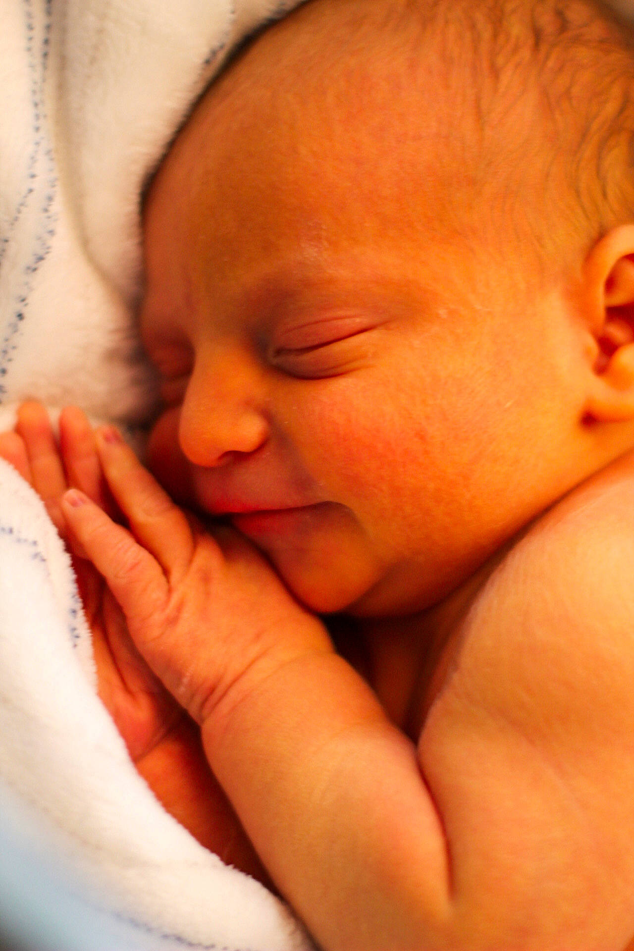 Jaycen is registered to the contest to win money with this photo: arm, baby, cheek, chin, comfort, ear, eye, eyebrow, eyelash, finger, gesture, hand, human_body, lip, mouth, neck, nose, person, skin, thumb