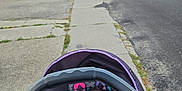 Zoey joined the competition — help win amazing prizes! baby, car_seat, blanket, sidewalk, street, suburban, outdoor, child, infant, purple, curious, daylight, residential, person, road, house, nature, walk, expression, safety