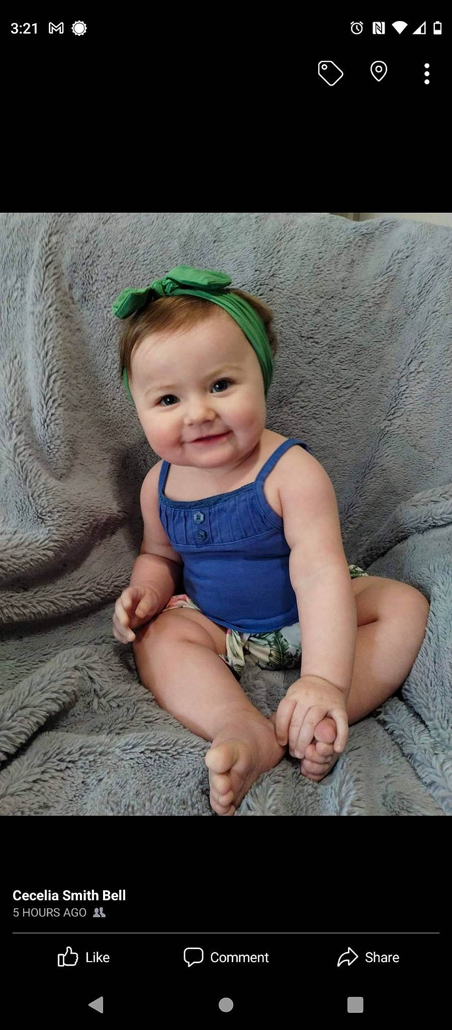 Jemma joined the competition — help win amazing prizes! baby, baby_toddler_clothing, cap, cheek, eye, face, fashion_accessory, flash_photography, grass, happy, head, human_leg, iris, joy, pattern, person, sitting, skin, sleeve, smile