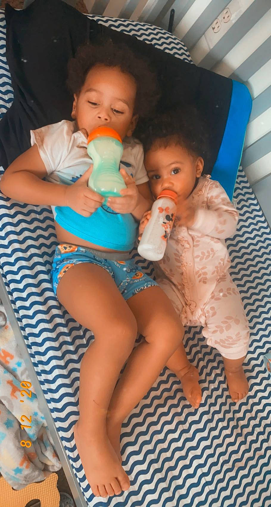 Lailani joined the competition — help win amazing prizes! abdomen, baby, facial_expression, finger, hairstyle, happy, head, human_body, leg, leisure, mouth, muscle, nail, organ, person, plastic_bottle, shorts, skin, thigh, toddler