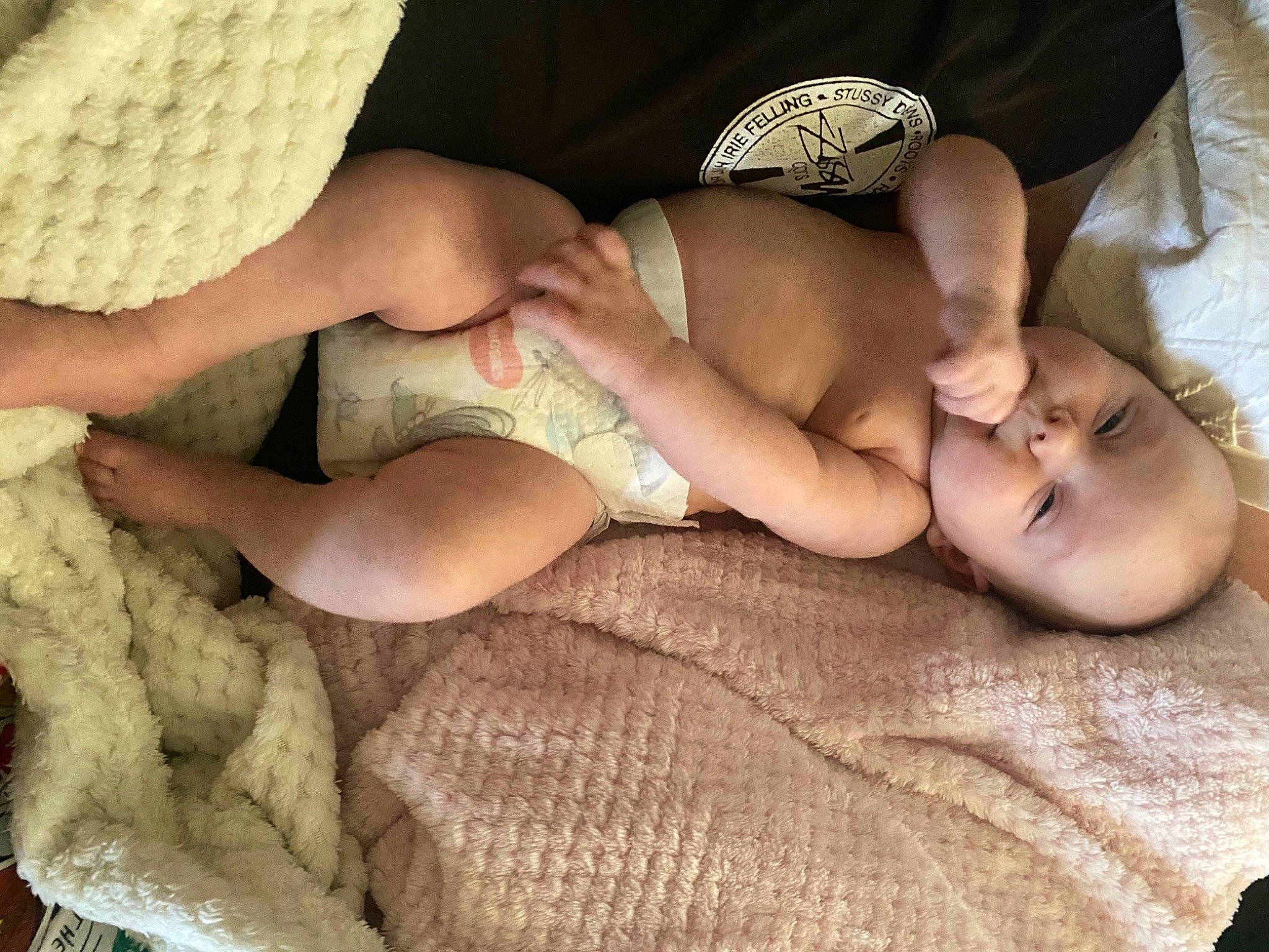 Winter is registered to the contest to win money with this photo: abdomen, arm, baby, chest, comfort, eye, finger, hand, head, human_body, joint, knee, leg, mouth, muscle, nail, person, skin, stomach, thigh