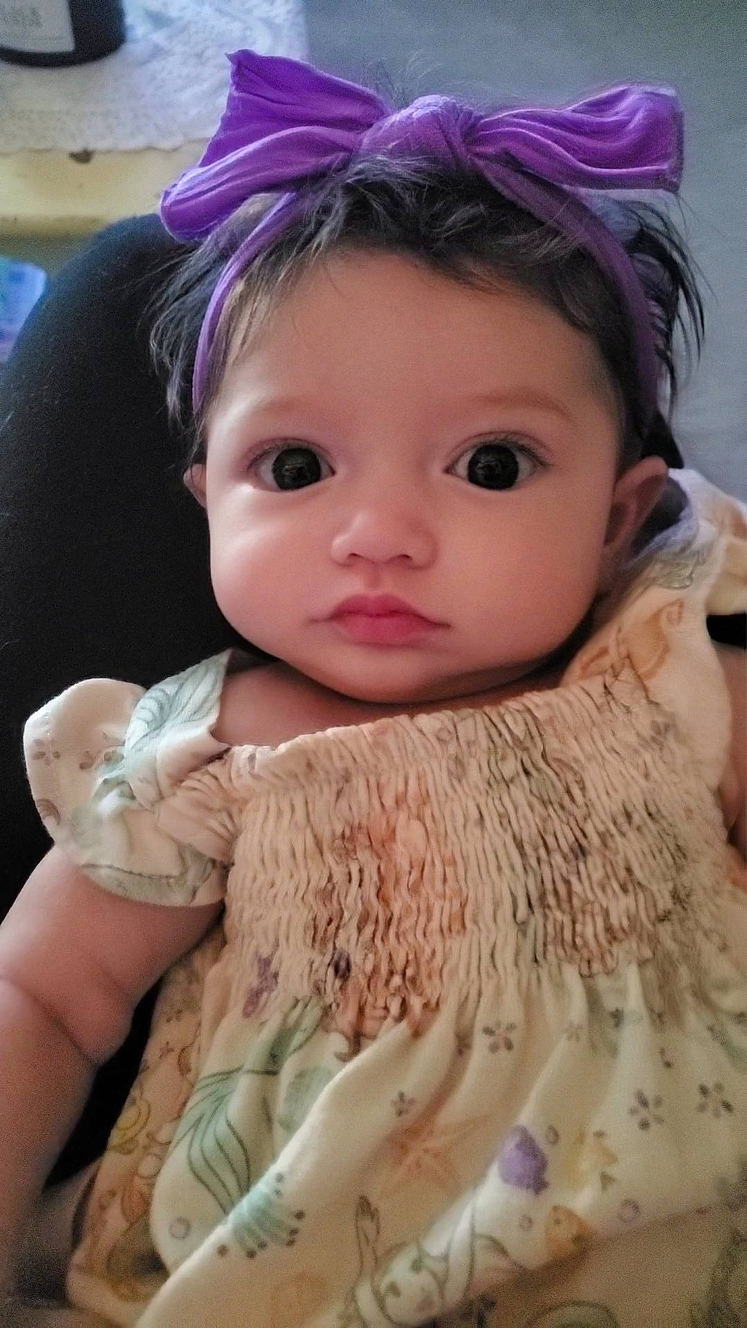 Nora is registered to the contest to win money with this photo: bangs, cheek, doll, dress, eye, eyebrow, eyelash, face, hairstyle, head, headgear, headpiece, iris, lip, long_hair, pink, skin, toddler, toy, wig