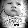 Luca joined the competition — help win amazing prizes! baby, infant, face, expression, onesie, clothing, text, black_and_white, portrait, close_up, child, cute, newborn, striped, person, young, gentleman, bow_tie, soft_light, indoors
