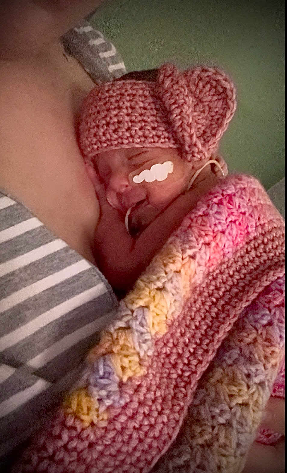 Naela is registered to the contest to win money with this photo: newborn, baby, sleeping, blanket, crocheted, hat, pink, striped_shirt, cozy, closeup, infant, person, child, resting, soft, warm, cute, face, skin, snuggled