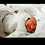 newborn, baby, sleeping, white_clothing, knitwear, hat, blanket, soft, peaceful, infant, cute, resting, portrait, indoors, closeup, cozy, child, person, warm, comfort