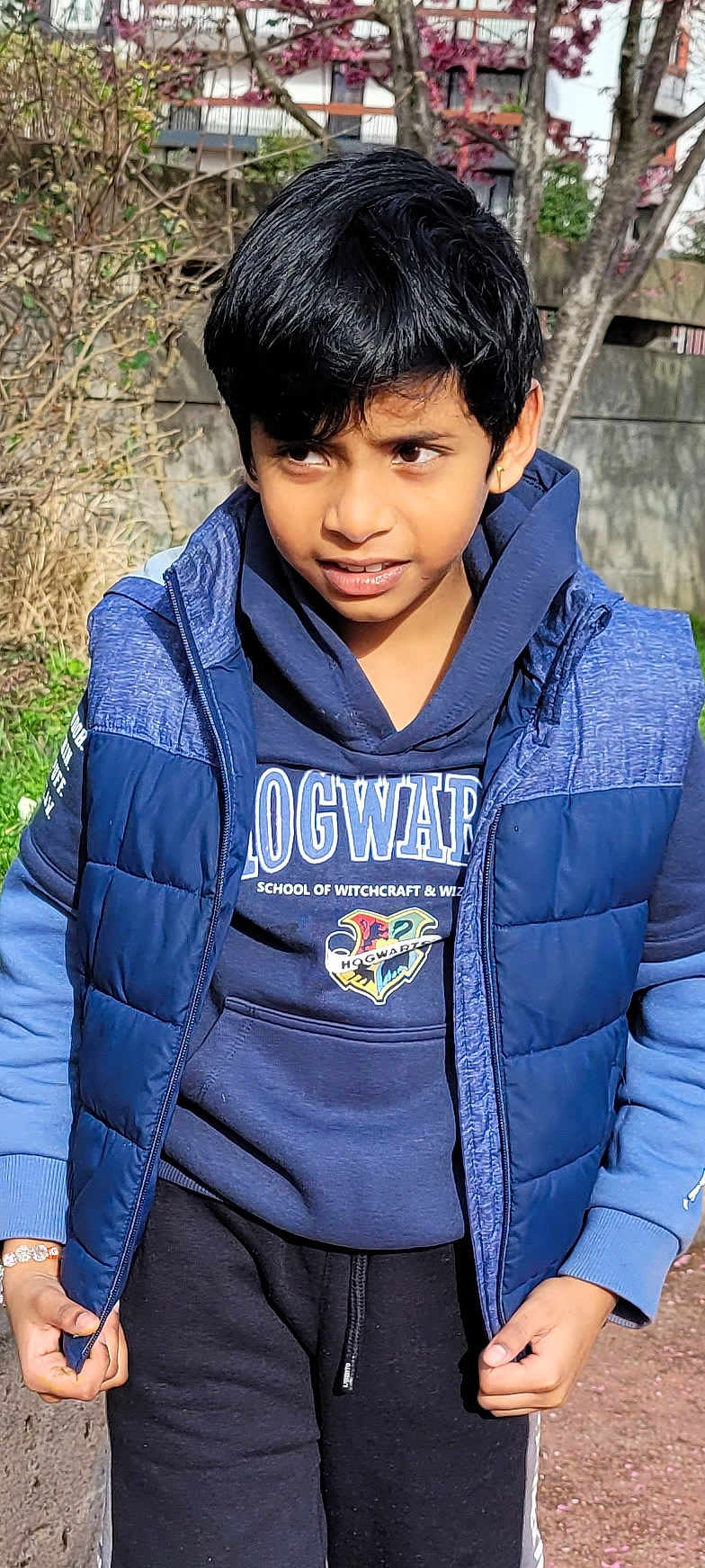 Sagith participe au concours pour gagner de l'argent avec cette photo : blackhair, boy, child, clothing, coat, dimples, face, hair, happy, head, jacket, male, pants, person, photography, portrait, sleeve, smile, student, vest