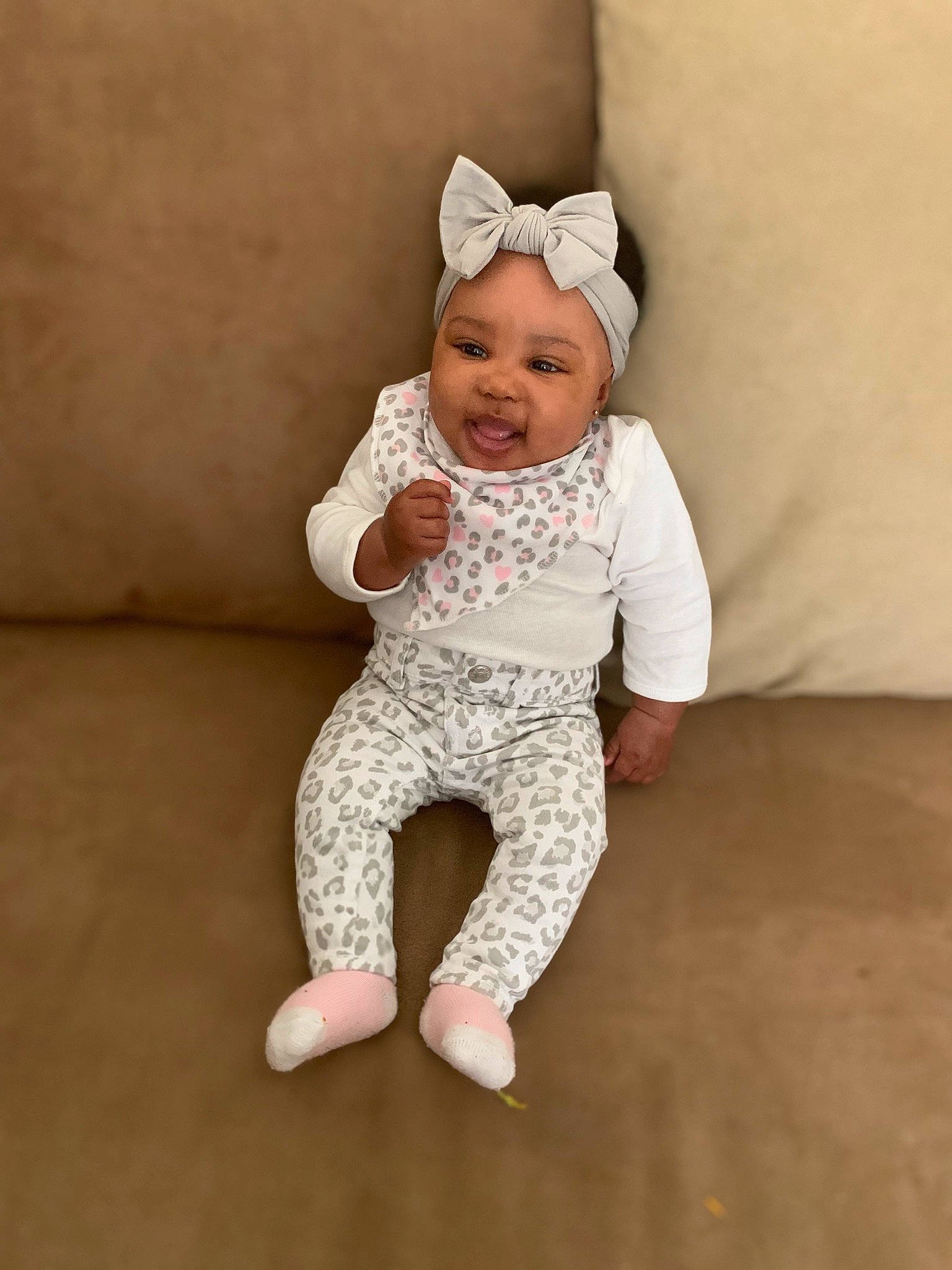 Norielle joined the competition — help win amazing prizes! arm, baby, baby_toddler_clothing, child, comfort, eye, flooring, foot, happy, head, headgear, headwear, human_body, human_leg, leg, pattern, person, sitting, skin, sleeve