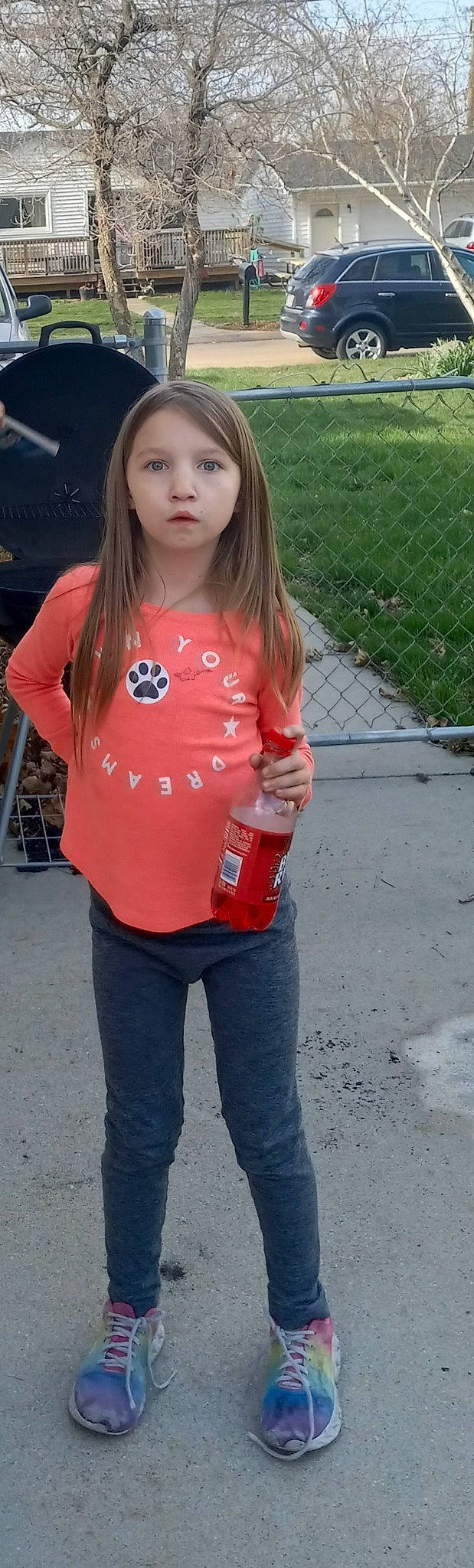 Lillie joined the competition — help win amazing prizes! blond, brown_hair, denim, face, fence, grass, hair, happy, head, jeans, lip, long_hair, pattern, person, pink, skin, sleeve, street_fashion, t_shirt, toddler