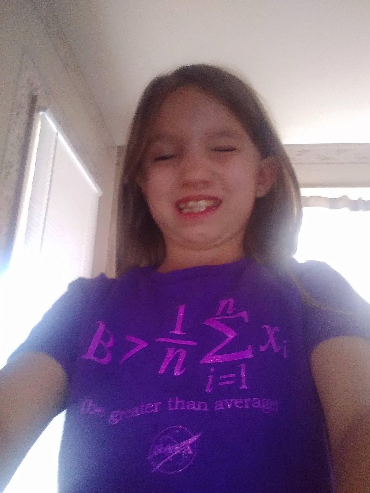 Lillie joined the competition — help win amazing prizes! arm, chin, door, eyebrow, eyelash, face, forehead, gesture, happy, iris, jaw, joint, joy, lip, mouth, neck, person, purple, shoulder, skin