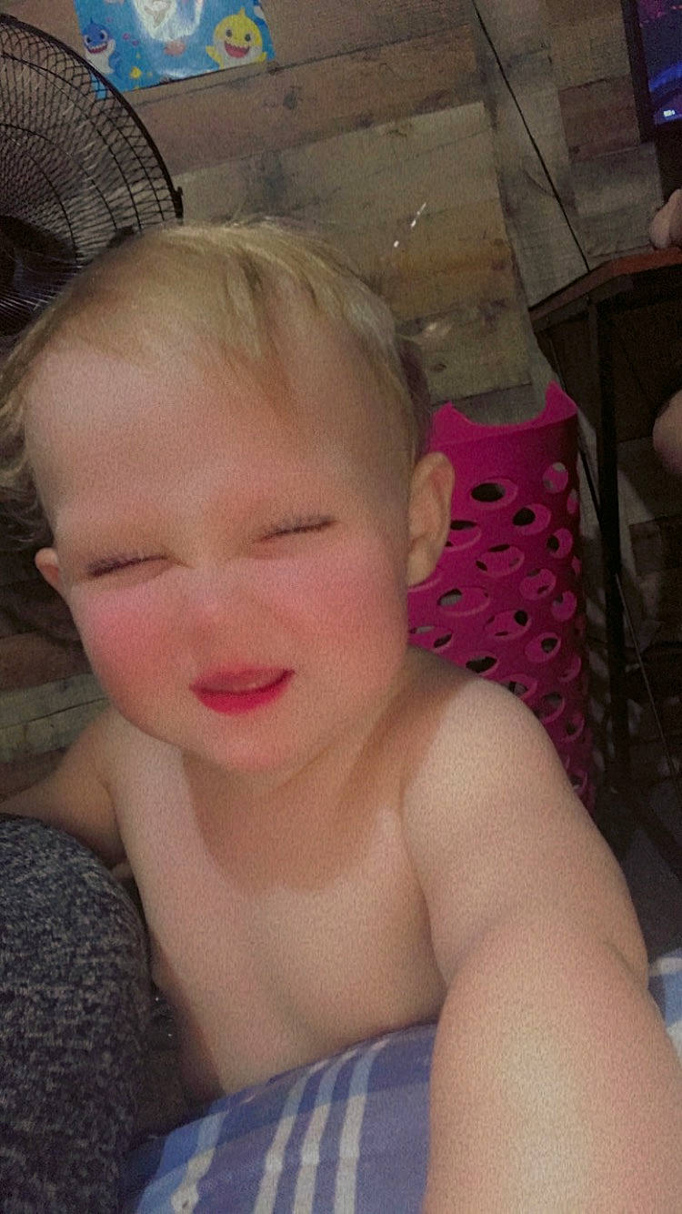 Kinzlee is registered to the contest to win money with this photo: cheek, chin, ear, eye, eyebrow, eyelash, face, finger, forehead, iris, jaw, lip, mammal, mouth, muscle, neck, nose, person, pink, skin