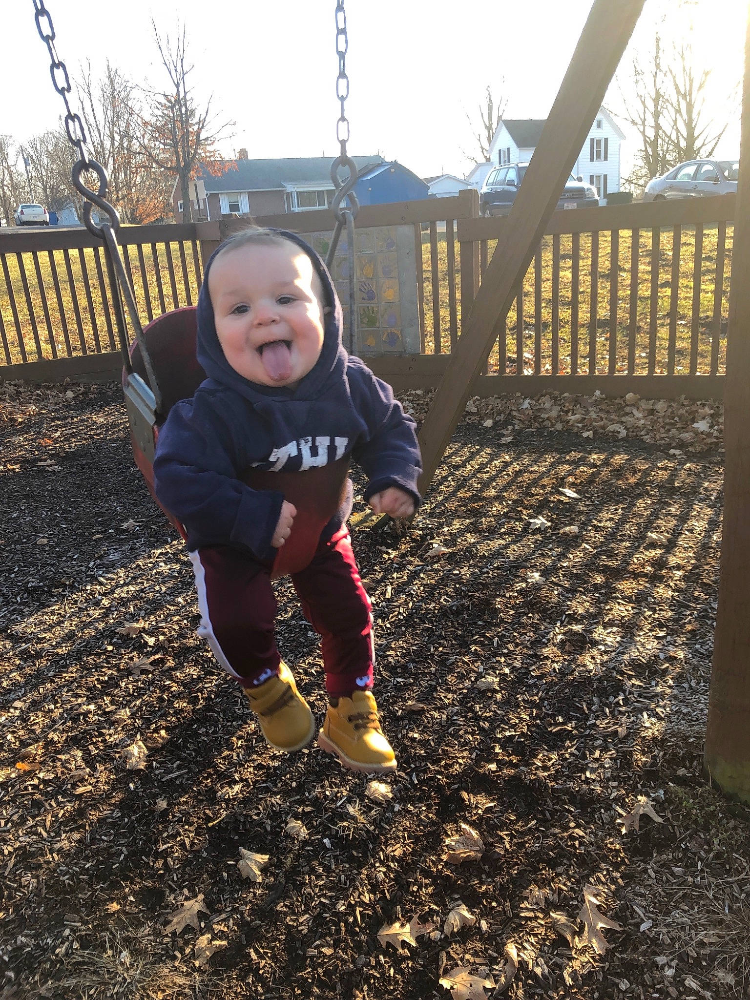 Donavan is registered to the contest to win money with this photo: child, day, fun, girl, grass, outdoor_play_equipment, person, plant, play, playground, public_space, recreation, soil, toddler, tree, vacation