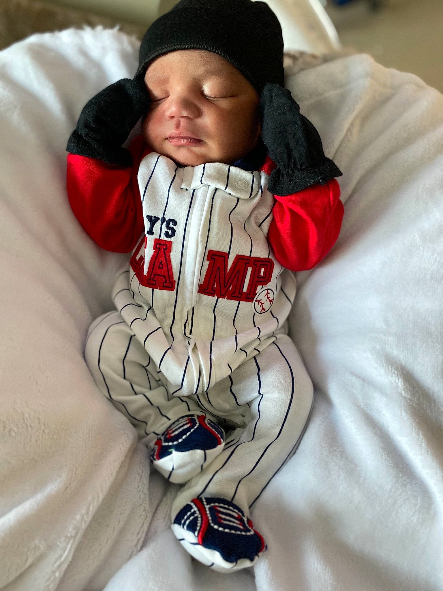 Dvonte is registered to the contest to win money with this photo: child, headwear, hoodie, outerwear, person, white