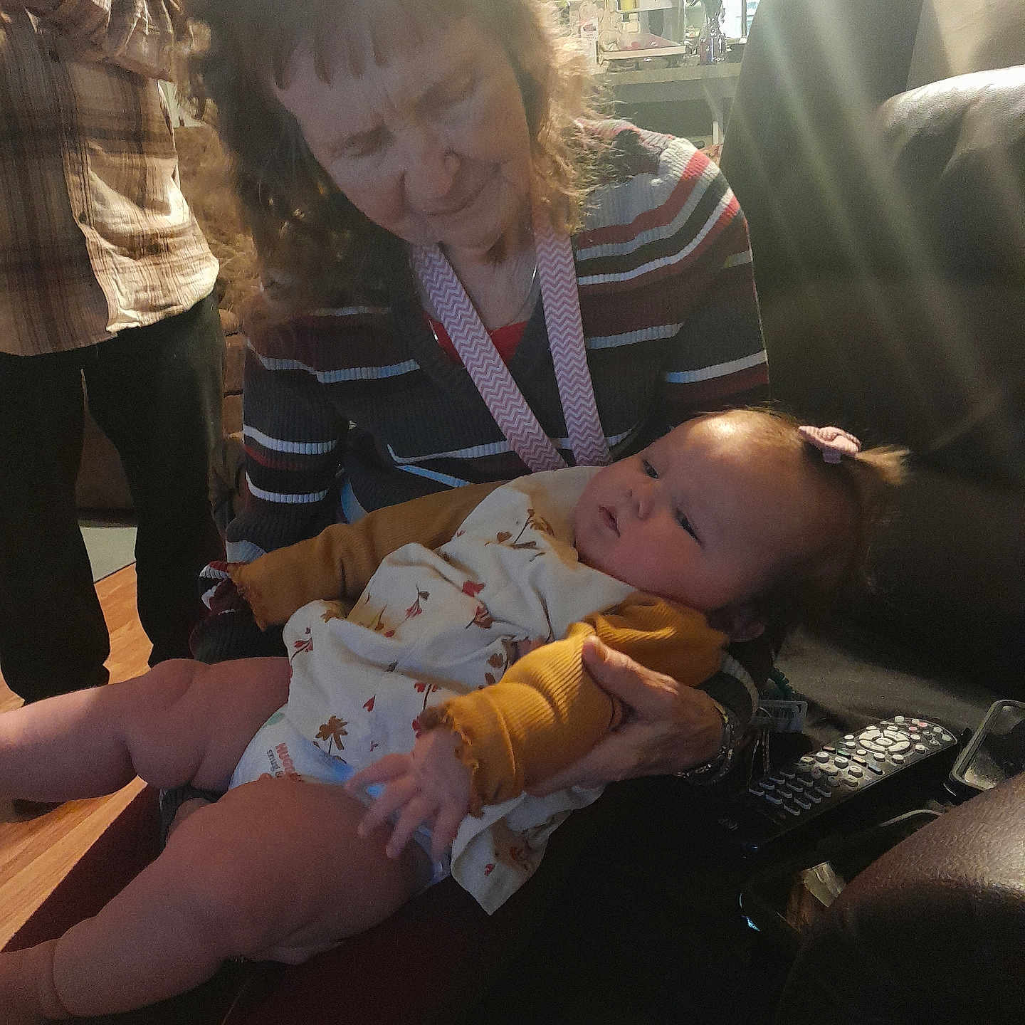 Iris joined the competition — help win amazing prizes! adult, baby, bodypart, couch, cushion, electronics, face, female, finger, furniture, hand, head, male, man, people, person, photography, portrait, remotecontrol, woman