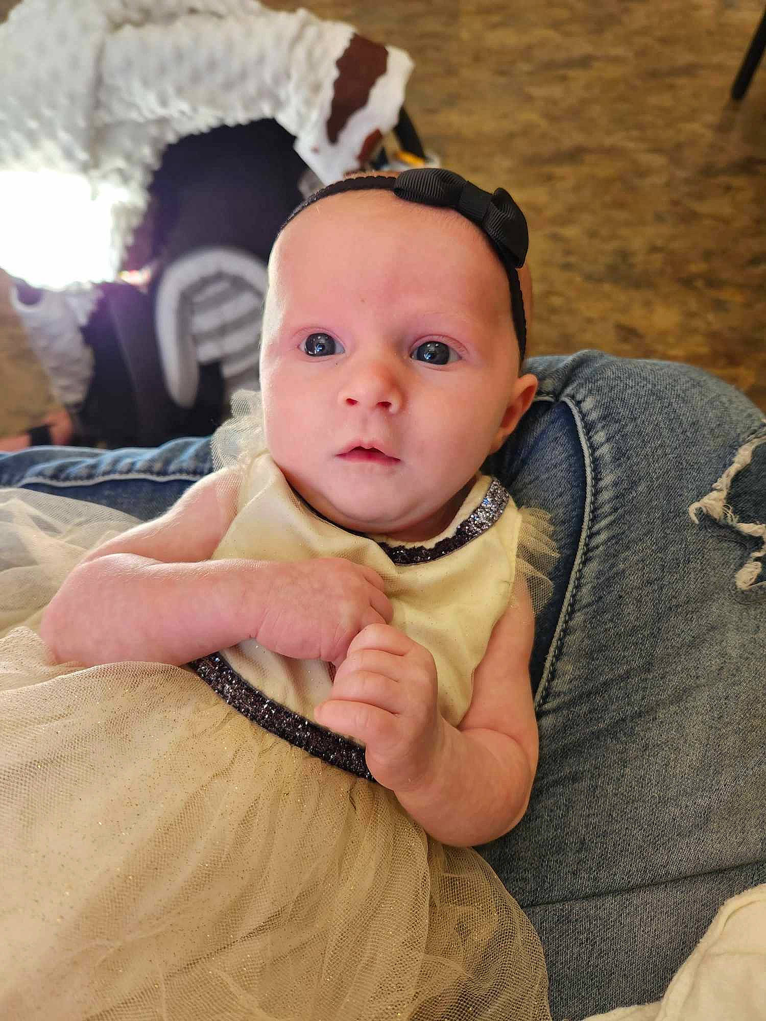 Amayah is registered to the contest to win money with this photo: abdomen, baby, baby_products, baby_toddler_clothing, cheek, child, comfort, eye, fun, fur, gesture, happy, head, nail, person, sitting, sleeve, thumb, toddler, toy