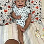 Eliana joined the competition — help win amazing prizes! baby, smiling, infant, onesie, pillow, halloween, pumpkin, cat, bat, hat, bed, blanket, pacifier_clip, flower, cute, happy, child, person, indoors, portrait