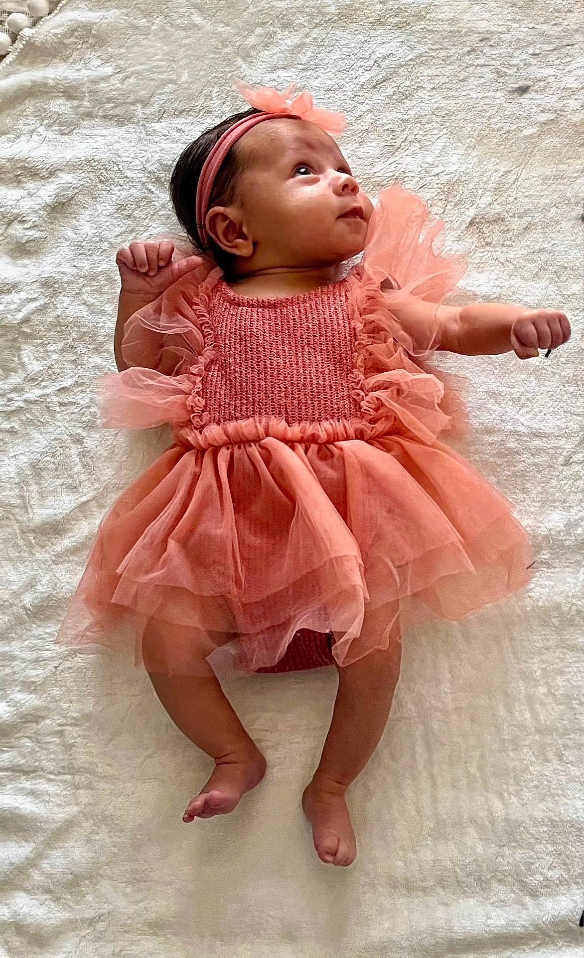 Brielle is registered to the contest to win money with this photo: accessories, baby, bodypart, bonnet, clothing, dress, face, finger, hair, hand, happy, hat, head, newborn, person, photography, portrait, sitting, sleeve, smile