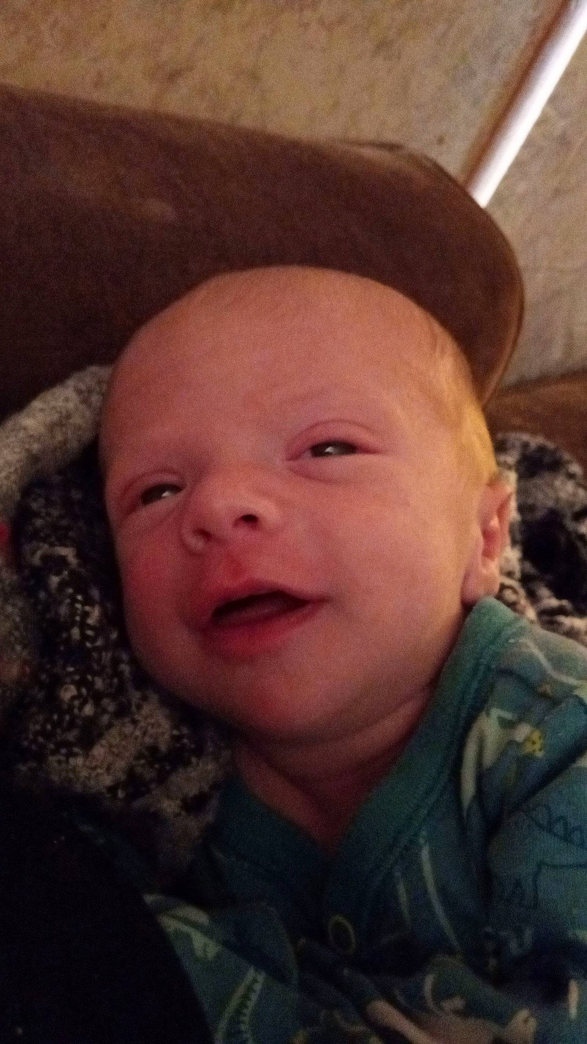 Lukas is registered to the contest to win money with this photo: baby, cheek, chin, comfort, ear, eyebrow, forehead, hair, happy, hat, head, iris, jaw, lip, mouth, nose, person, skin, smile, toddler