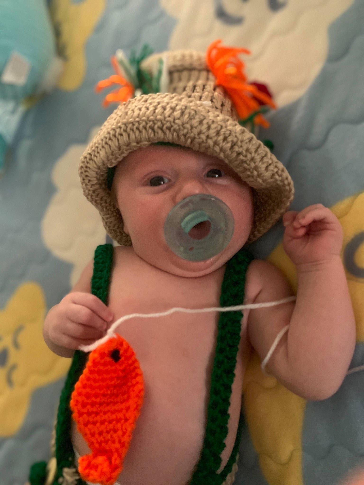 Bentley is registered to the contest to win money with this photo: art, baby, baby_products, baby_sleeping, cap, child, costume, fashion_accessory, fun, fur, happy, hat, headgear, headwear, linens, mouth, person, personal_protective_equipment, plush, stuffed_toy