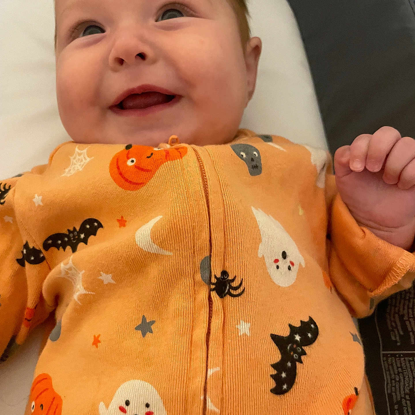 Amirah is registered to the contest to win money with this photo: applique, baby, babylaughing, blanket, bodypart, cushion, face, finger, hand, happy, head, homedecor, pattern, person, photography, portrait, smile