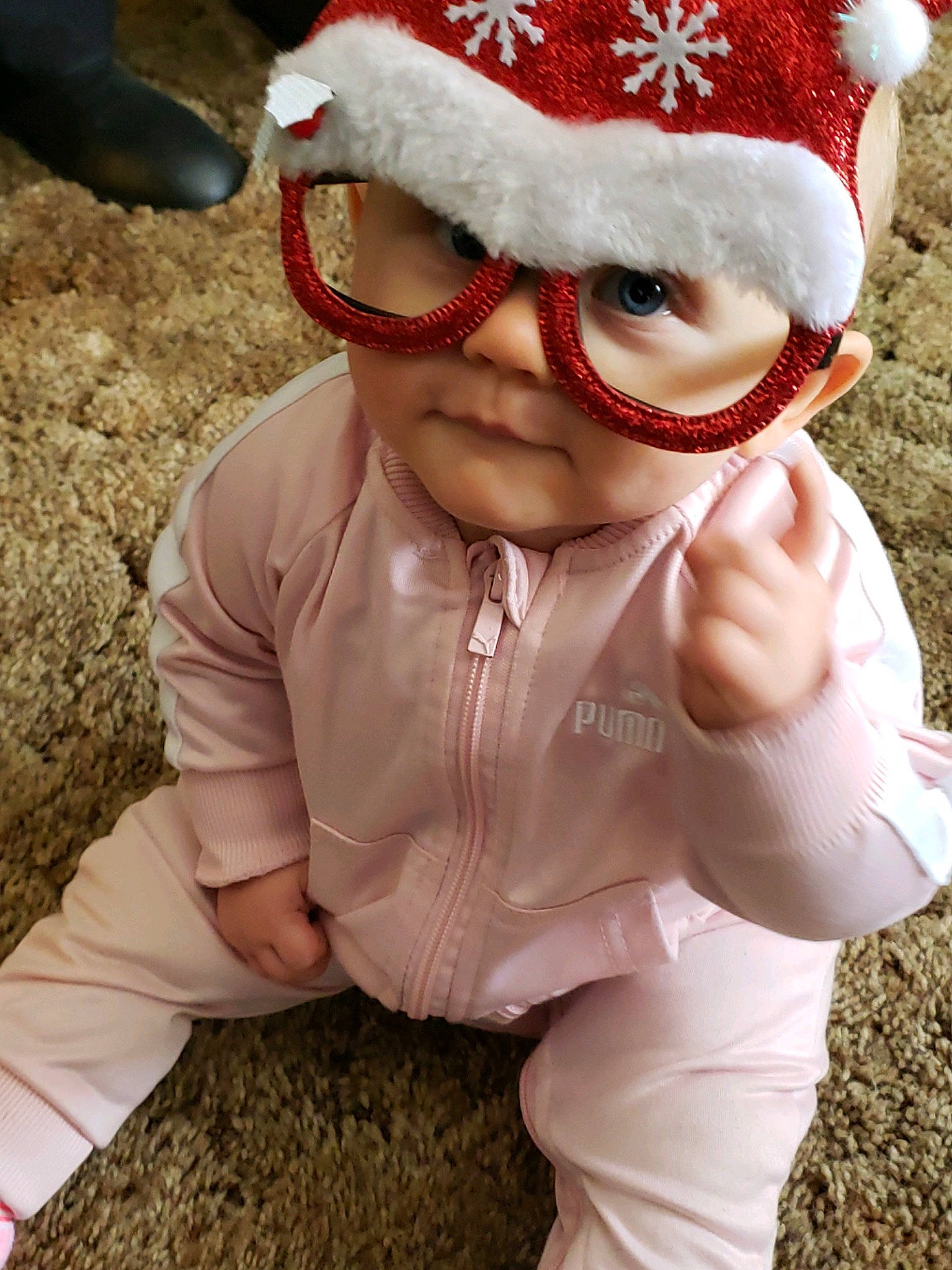 Harper is registered to the contest to win money with this photo: beard, child, christmas, facial_hair, fictional_character, glasses, headgear, person, santa_claus, smile