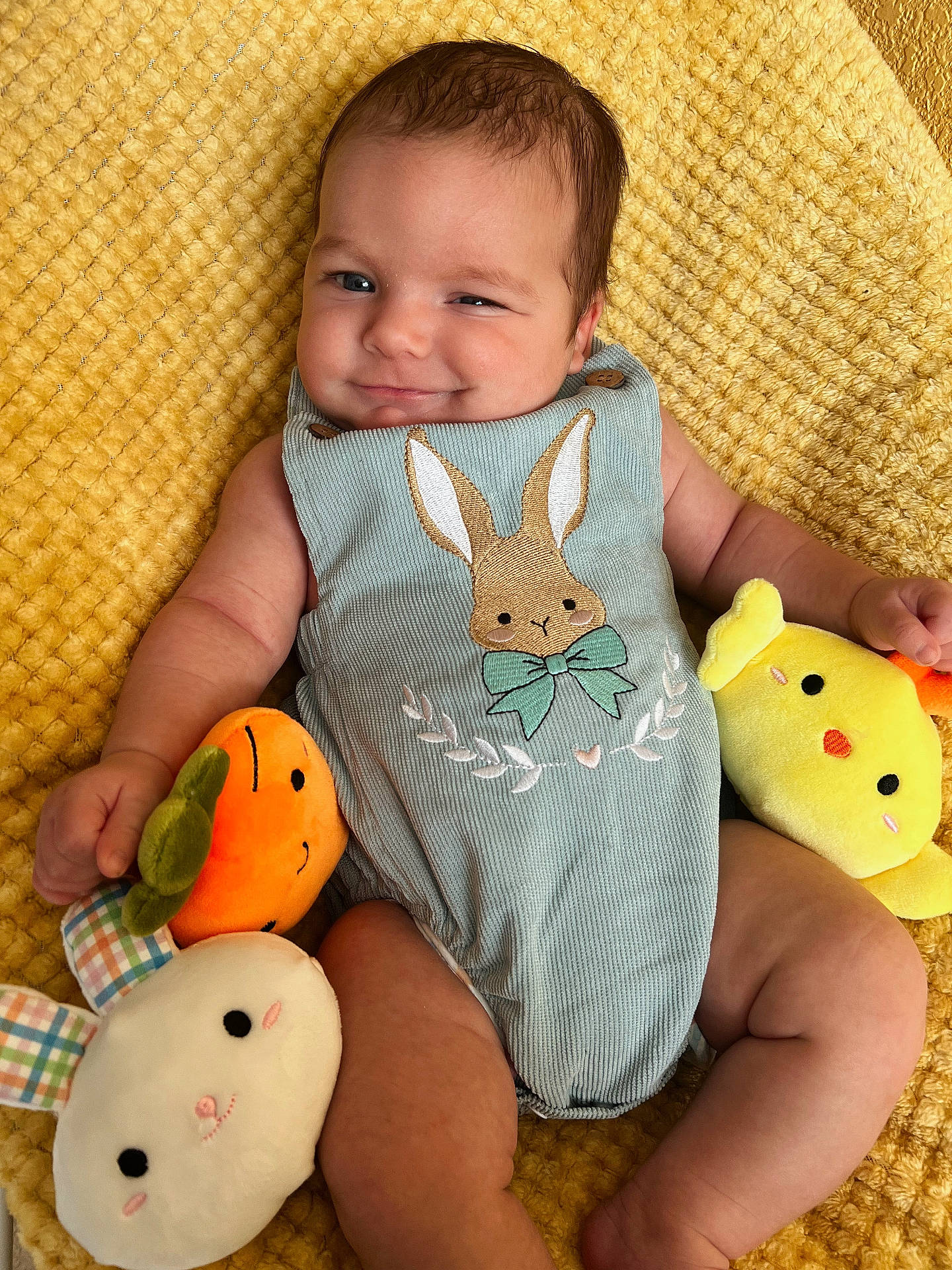 Braeson joined the competition — help win amazing prizes! applique, baby, blanket, bodypart, couch, cushion, face, finger, furniture, hand, head, homedecor, newborn, pattern, person, photography, plush, portrait, sitting, toy