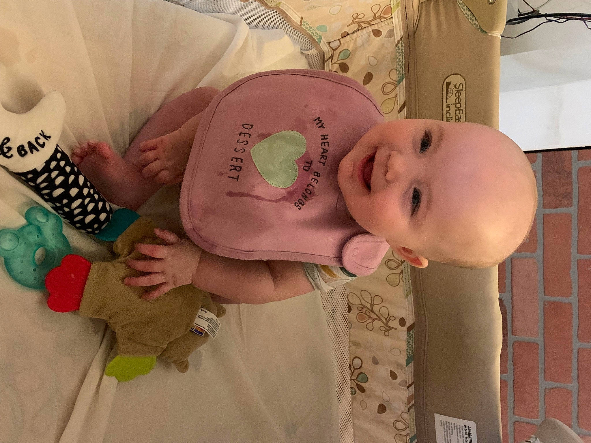 Nyomi joined the competition — help win amazing prizes! baby, baby_laughing, baby_products, baby_toddler_clothing, cheek, child, eyelash, fashion_accessory, finger, happy, headgear, joy, nail, pattern, person, pink, room, skin, sleeve, smile