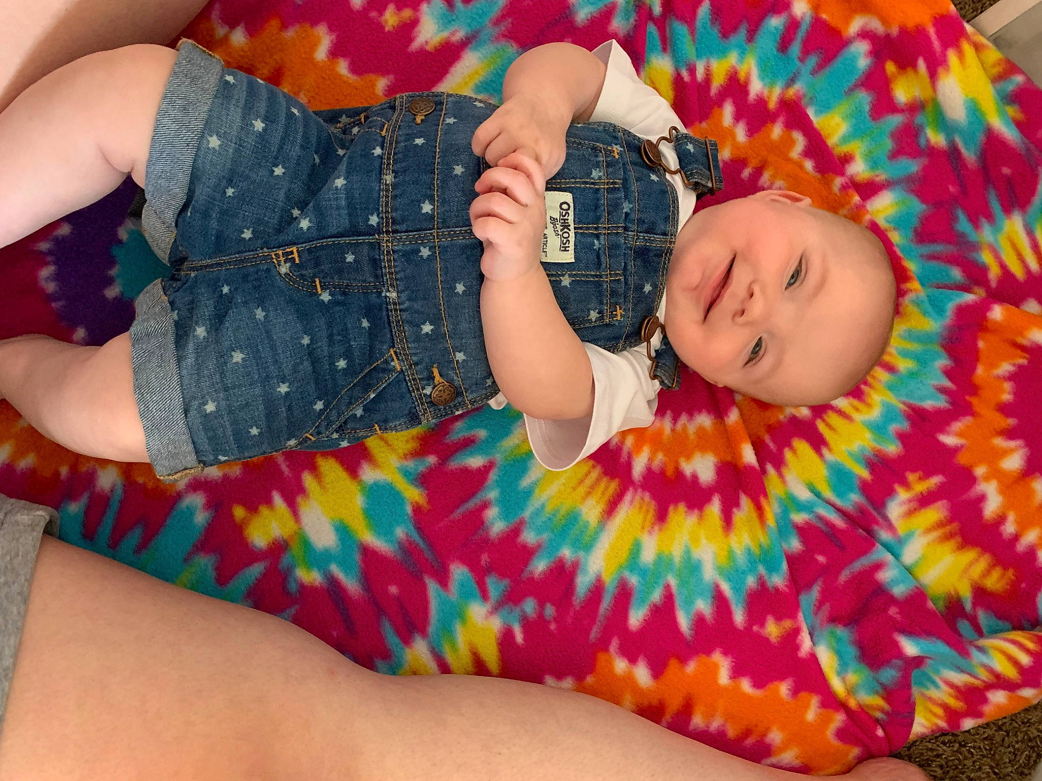 Nyomi joined the competition — help win amazing prizes! baby, baby_toddler_clothing, child, comfort, dress, fashion, fun, happy, human_body, human_leg, joy, nail, orange, pattern, person, pink, skin, sleeve, smile, textile