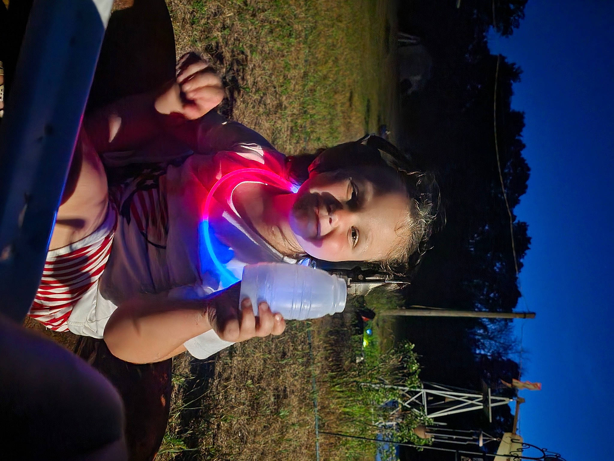 Aria is registered to the contest to win money with this photo: arm, child, electric_blue, flash_photography, fun, grass, happy, leisure, lens_flare, magenta, people_in_nature, person, plant, purple, recreation, sky, smile, t_shirt, toddler, tree