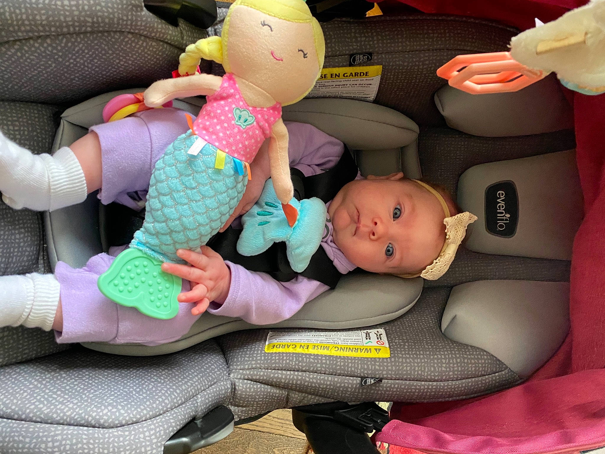 Haevyn is registered to the contest to win money with this photo: art, auto_part, baby_products, baby_toddler_clothing, baby_toys, car, car_seat, child, comfort, doll, family_car, finger, nail, person, pink, plush, stuffed_toy, thigh, thumb, toy