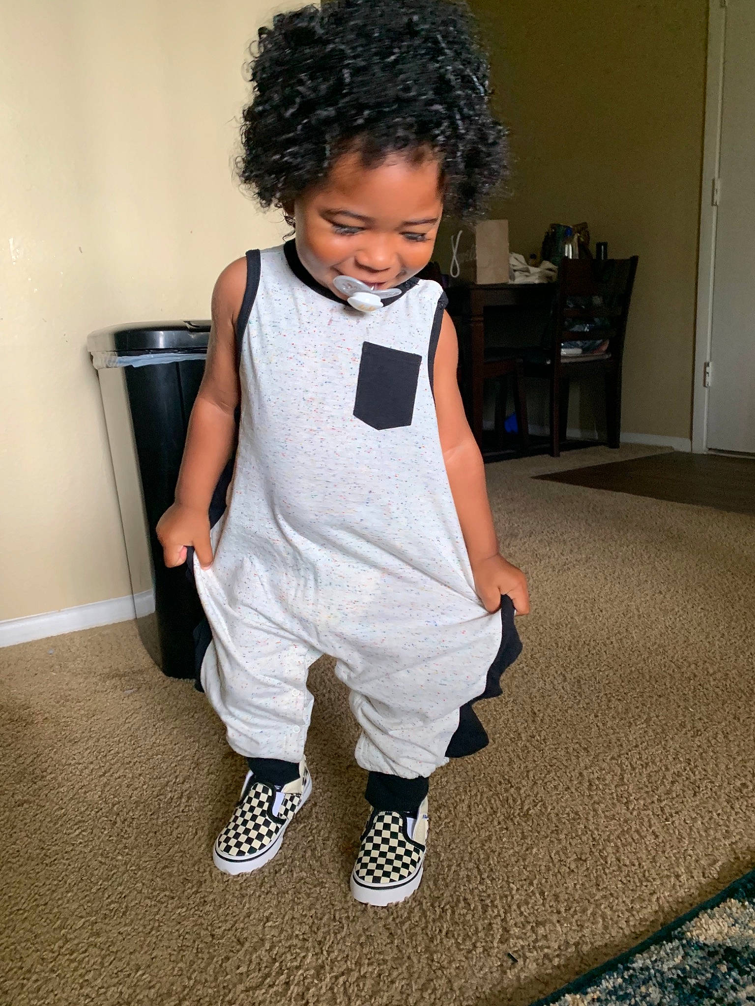 Imari joined the competition — help win amazing prizes! afro, child, cool, costume, flooring, hairstyle, human, joy, outerwear, person, shoe, sportswear, t_shirt, toddler, white