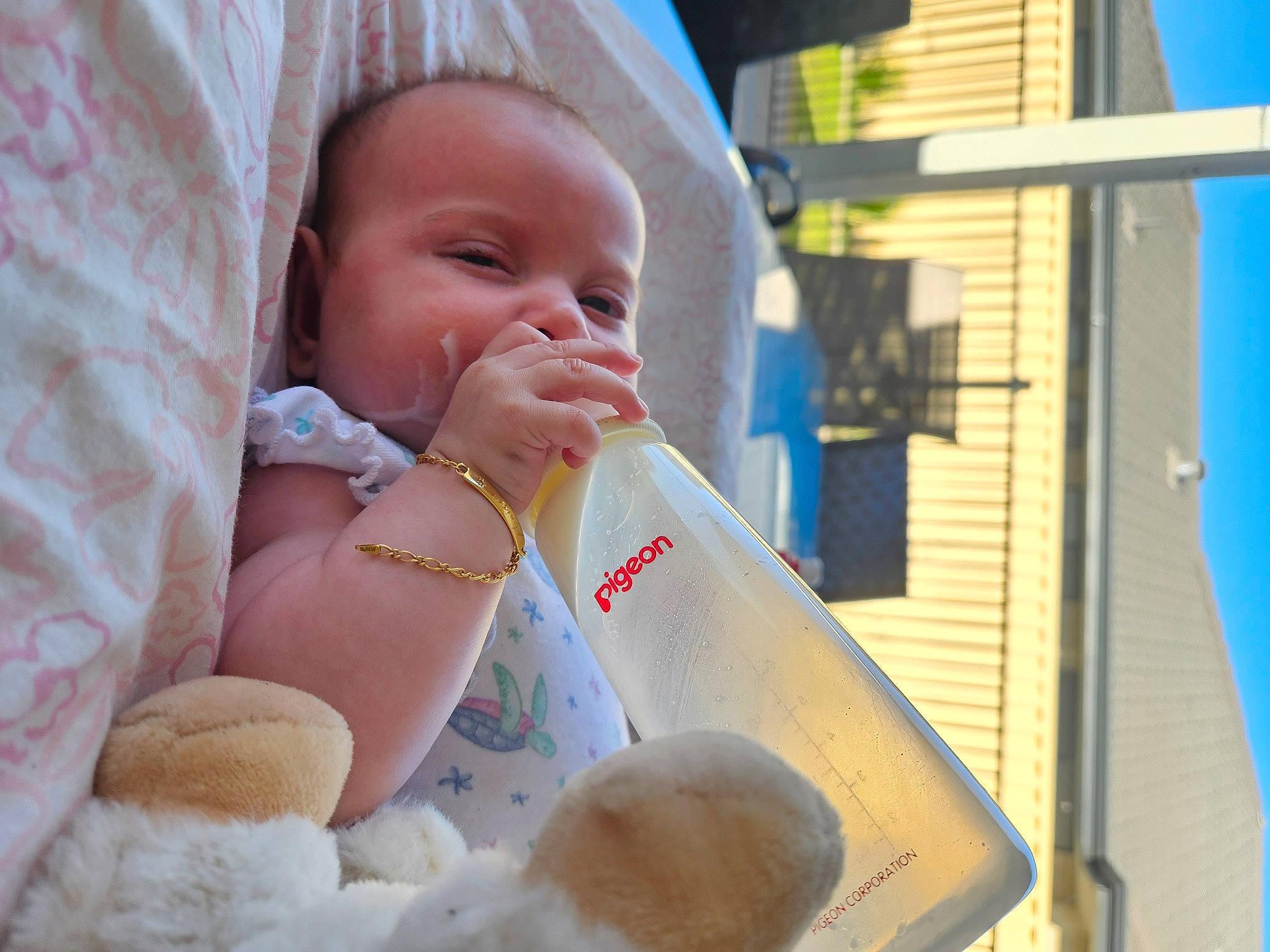 Maziee is registered to the contest to win money with this photo: baby, baby_products, baby_toddler_clothing, blue, child, comfort, fashion_accessory, fun, happy, hat, human, linens, nose, person, sitting, sky, sun_hat, toddler, vacation