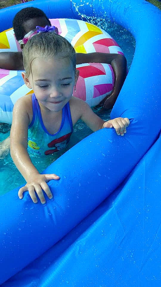 Serenity is registered to the contest to win money with this photo: amusement_park, child, fun, games, inflatable, joy, leisure, nonbuilding_structure, person, play, recreation, smile, summer, toddler, vacation, water_park