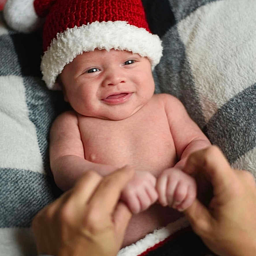 Abram joined the competition — help win amazing prizes! baby, beanie, blanket, bodypart, bonnet, cap, clothing, couch, face, finger, glove, hand, happy, hat, head, newborn, person, photography, portrait, smile