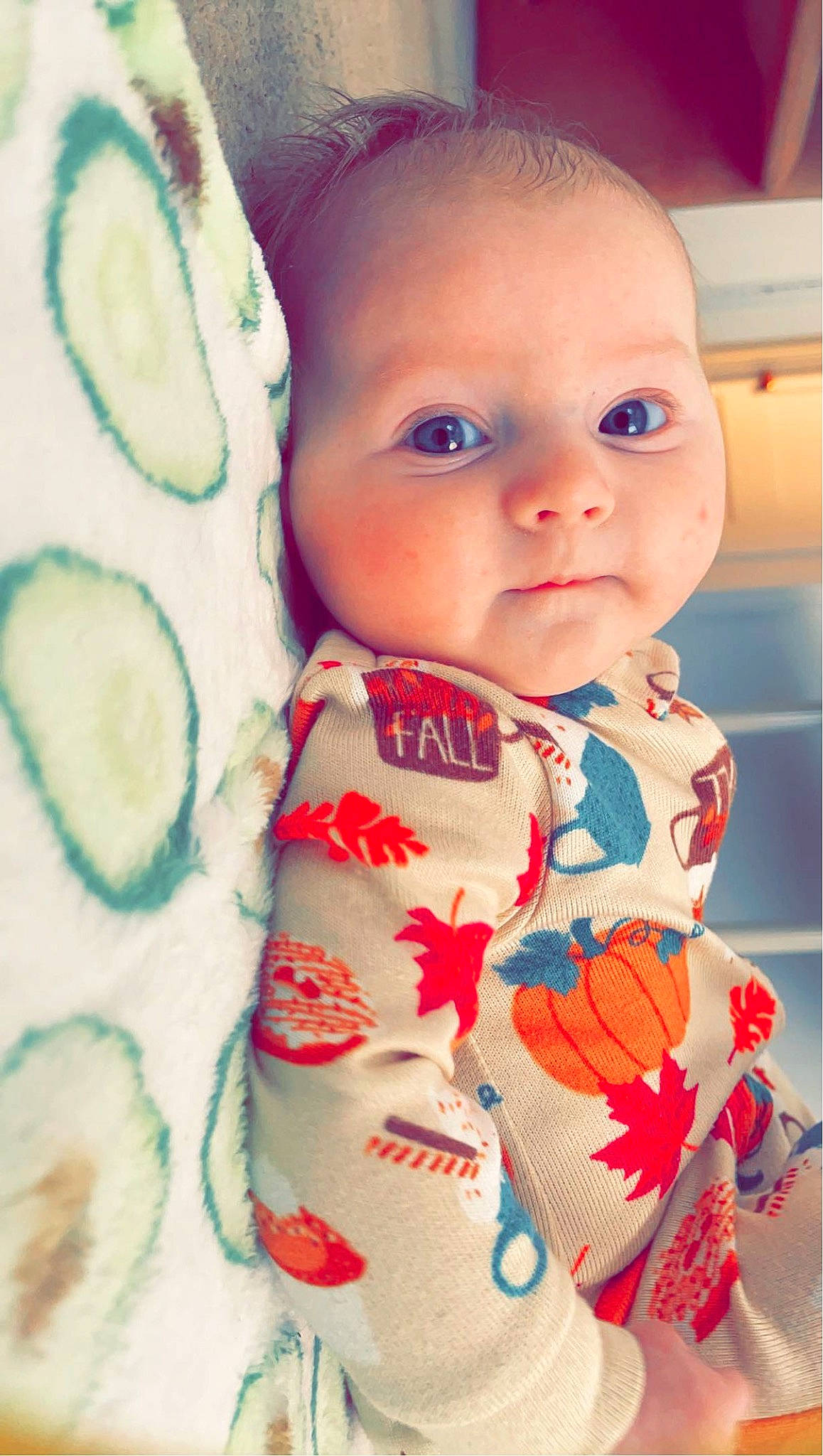 Rynlee is registered to the contest to win money with this photo: baby, baby_toddler_clothing, cheek, child, close_up, cucumber, facial_expression, finger, fruit, happy, lip, mouth, neck, nose, pattern, person, skin, sleeve, textile, toddler