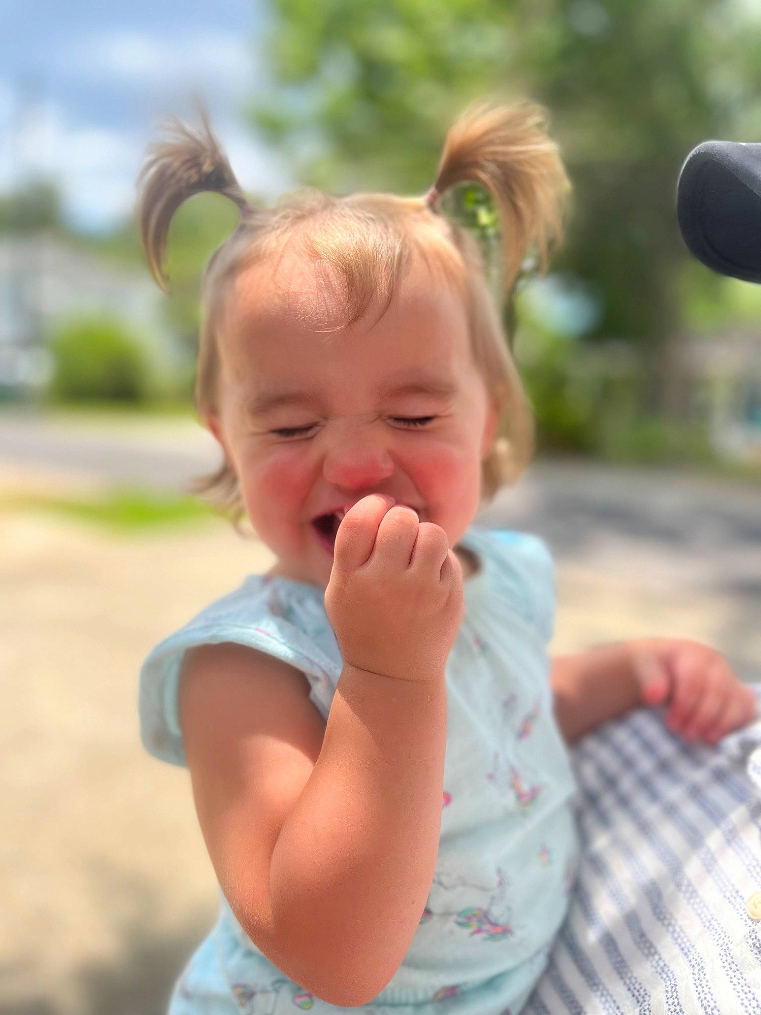 Reagan joined the competition — help win amazing prizes! arm, baby, baby_toddler_clothing, child, face, finger, fun, gesture, grass, hand, happy, human_body, leisure, lip, people_in_nature, person, plant, recreation, skin, thumb