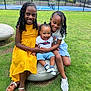 Kayden joined the competition — help win amazing prizes! braided_hair, casual_clothing, child, children, family, fence, grass, happy, laughing, nature, outdoor, park, playful, shoes, smiling, stone, sunny_day, tennis_court, toddler, yellow_dress