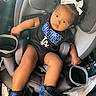Ellayah joined the competition — help win amazing prizes! toddler, child, car_seat, sneakers, nike, blue, black, white_bow, clothing, person, seat, safety, infant, baby, cute, indoors, car_interior, footwear, portrait, young_child