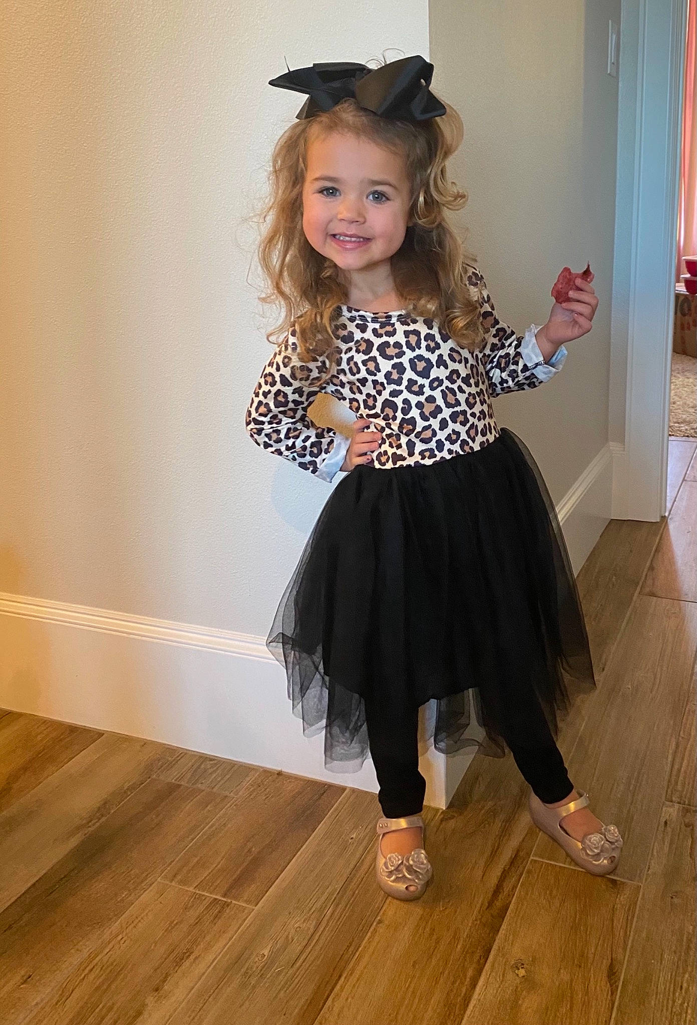 Frankie joined the competition — help win amazing prizes! baby_toddler_clothing, child_model, costume_accessory, curtain, day_dress, embellishment, floor, flooring, foot, hair_accessory, hardwood, headband, joy, laminate_flooring, one_piece_garment, person, toddler, varnish, wood, wood_flooring