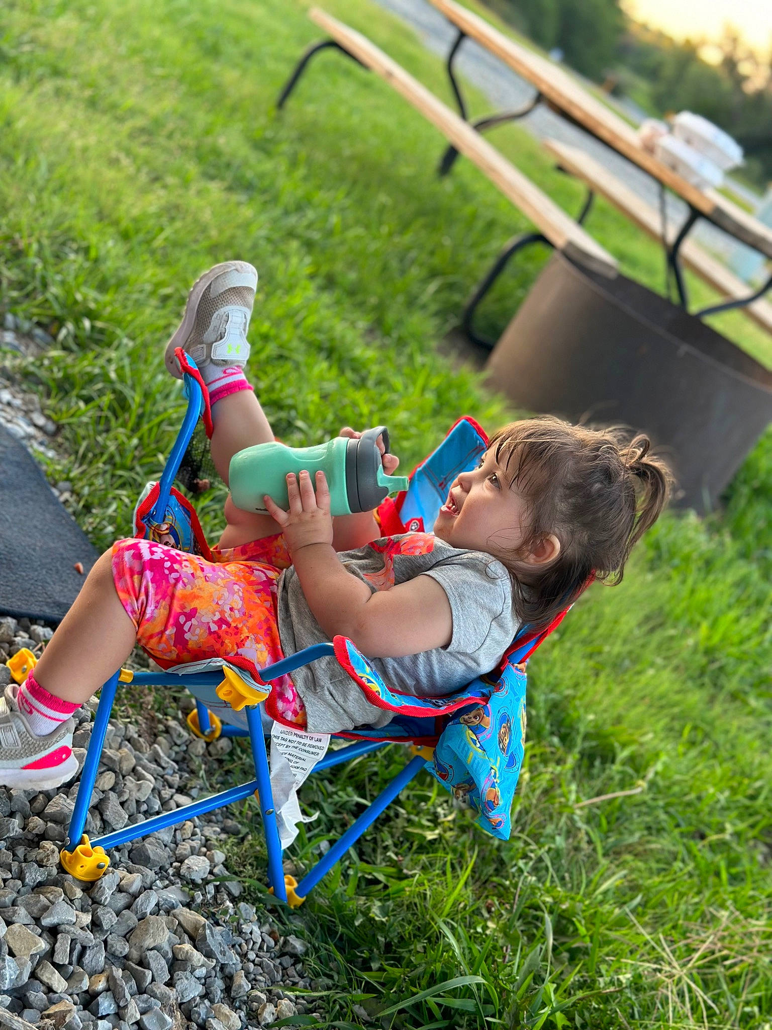 Vivianna joined the competition — help win amazing prizes! adventure, baby_toddler_clothing, child, electric_blue, fun, grass, grassland, happy, landscape, leisure, outdoor_play_equipment, people_in_nature, person, plant, play, recreation, shorts, soil, swing, toddler