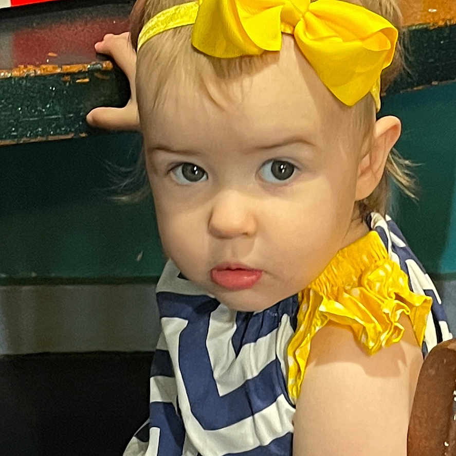 Alexandria joined the competition — help win amazing prizes! accessories, baby, bodypart, clothing, dress, face, finger, formalwear, hand, head, headband, machine, person, photography, portrait, tie, toy, transportation, vehicle, wheel