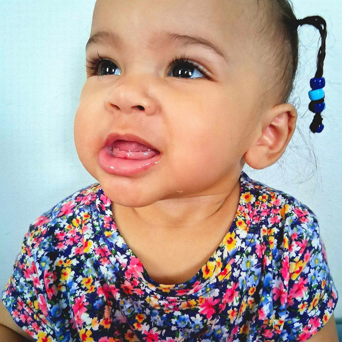 Harlow joined the competition — help win amazing prizes! baby, beads, braid, child, colorful_clothing, curious, cute, expression, eyes, face, floral_pattern, hair, head, indoor, mouth, person, portrait, skin, toddler, young_child