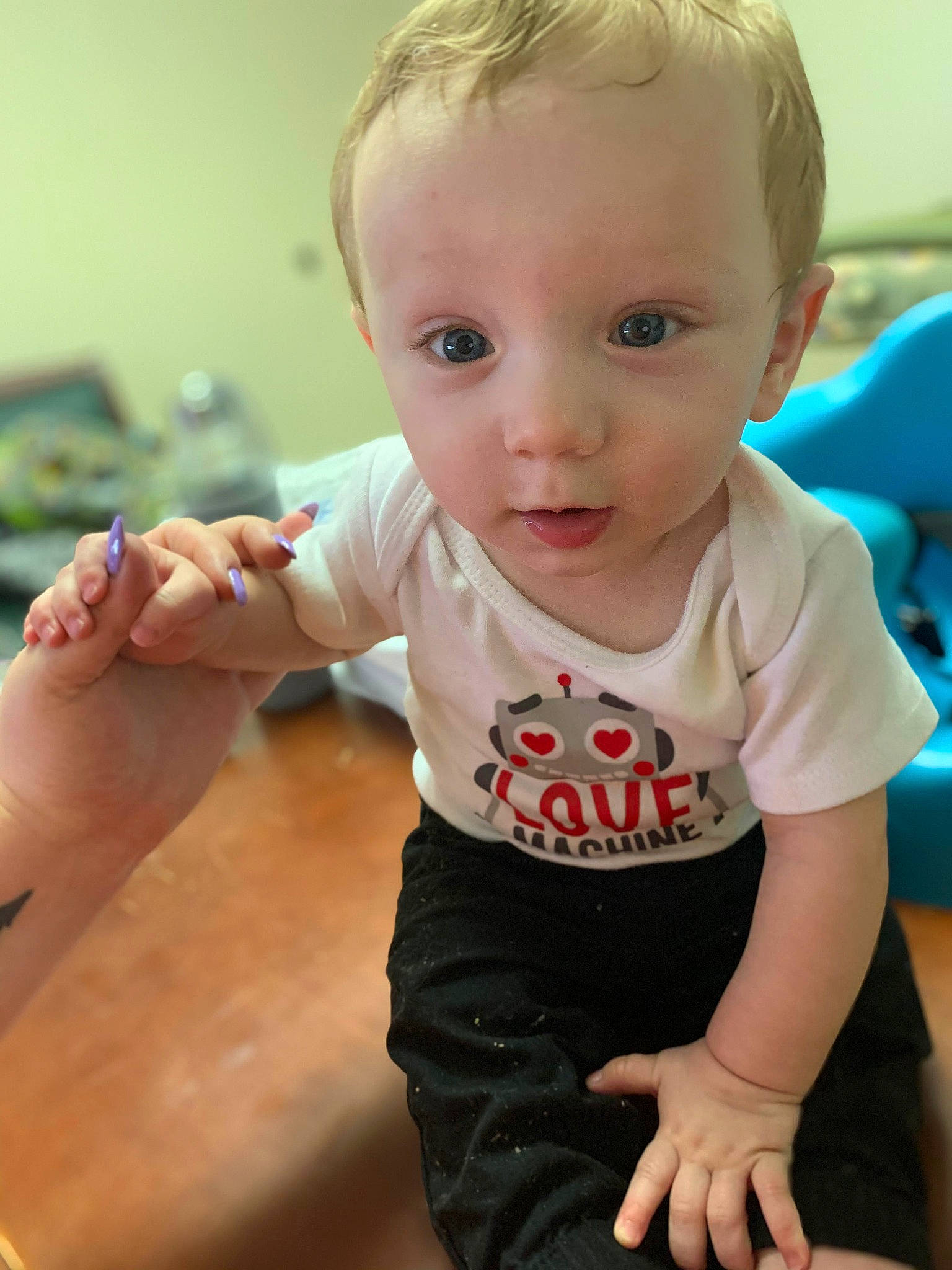 Bellamy joined the competition — help win amazing prizes! arm, baby, baby_toddler_clothing, blond, cheek, child, eye, face, finger, hand, head, person, play, sitting, skin, t_shirt, thumb, toddler
