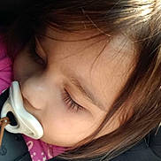Oktavia joined the competition — help win amazing prizes! child, toddler, sleeping, pacifier, blanket, car_seat, face, hair, closeup, peaceful, resting, indoors, young_child, infant, seatbelt, cozy, soft_light, portrait, baby, nap