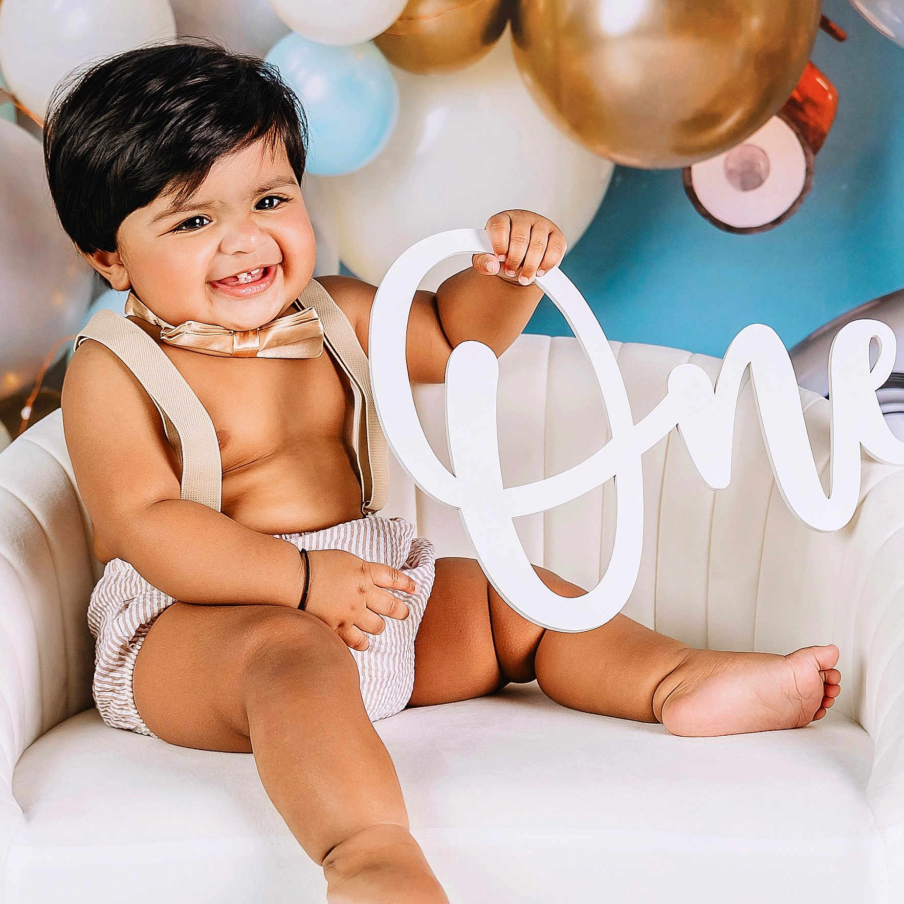 Kiaan joined the competition — help win amazing prizes! accessories, baby, babylaughing, balloon, bathing, clothing, face, happy, head, laughing, lingerie, people, person, photography, portrait, sitting, smile, swimwear, text, underwear