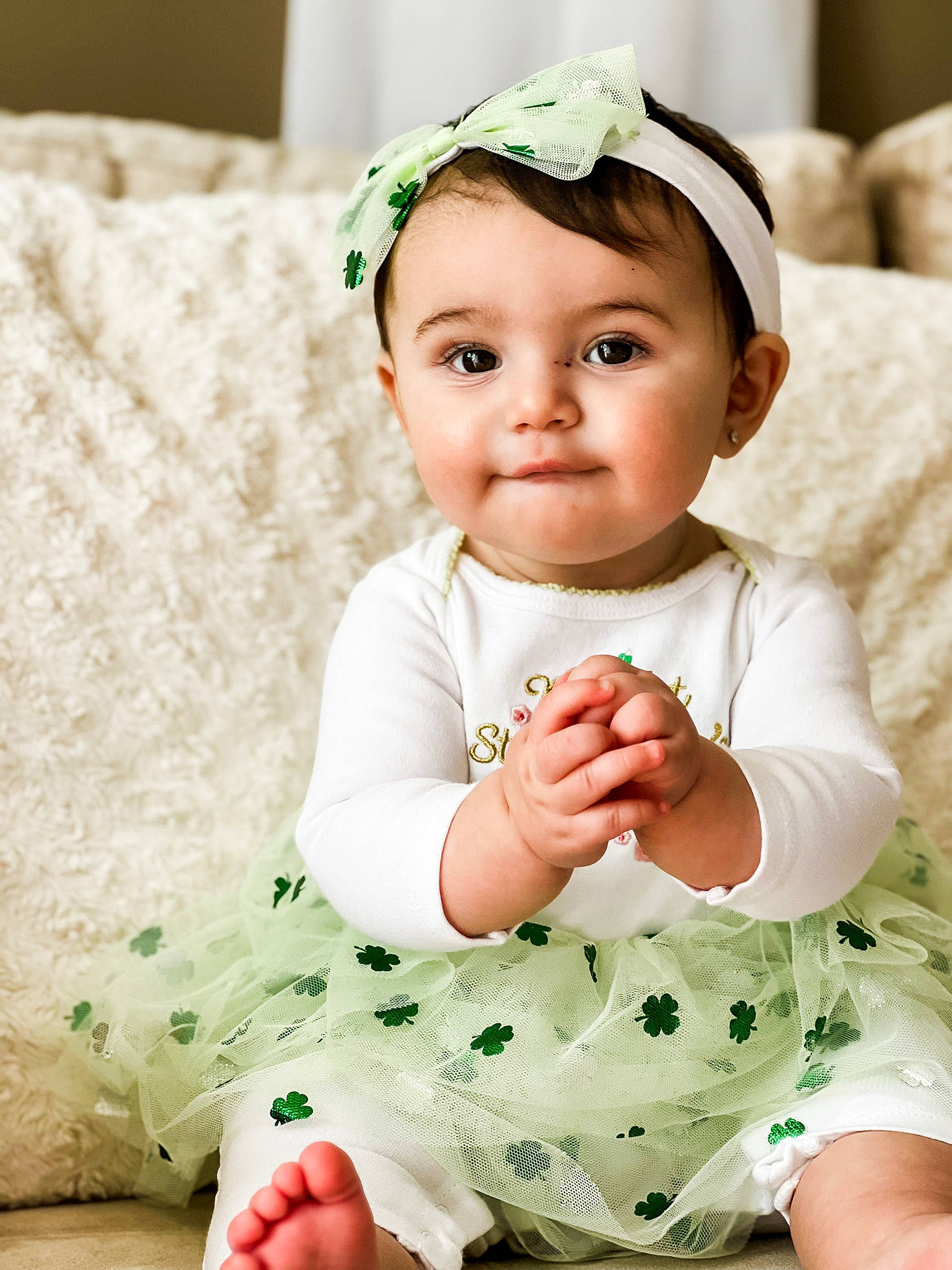 Faith is registered to the contest to win money with this photo: baby, baby_toddler_clothing, cap, child, fashion_accessory, finger, flash_photography, grass, green, hair_accessory, happy, headband, headpiece, pattern, person, pink, sitting, skin, sleeve, toddler