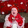 Lizzie joined the competition — help win amazing prizes! baby, blanket, bow, cheerful, child, christmas, cute, festive, happy, headband, holiday, indoors, portrait, red, red_clothing, seat, smiling, toddler, tutu, white