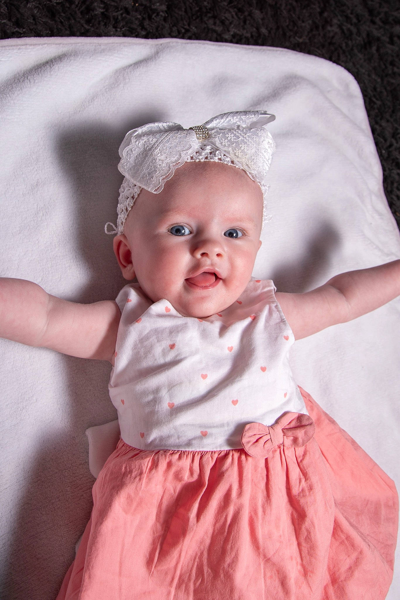 Inaya a rejoint le concours — aidez-le/la à gagner de superbes lots ! baby, baby_toddler_clothing, child, day_dress, embellishment, flash_photography, happy, headband, headpiece, iris, magenta, one_piece_garment, pattern, person, photograph, pink, skin, sleeve, textile, toddler